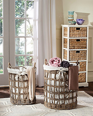 Double up on style and versatility with this set of two storage hampers with fabric lining. Crafted with kubu rattan for a rich texture, its gray finish refreshes the laundry room, pantry or playroom. Convenient nesting design, removable liners and built-in handles make laundry day a breeze.Set of 2 | Made of rattan | Removable cotton liner | Built-in handles | Nesting design | Gray finish | Wipe spills immediately; dust regularly; clean with mild soap and water