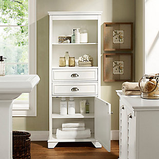 Not quite ready for the inconvenience and expense of a complete bathroom remodel? This line of stylish storage solutions will help you create the bathroom of your dreams. The high-end design of this tall cabinet keeps your bathroom essentials neatly stored away and still close at hand. Open upper shelving is ideal for display, while roomy drawers contain smaller items and lower cabinet hides the rest. At home in the tightest or most spacious bath, its compact footprint allows you to live large in small places.Made of wood, veneers and engineered wood | Steel-tone metal accents | 2 storage drawers | 2 upper shelves; 2 lower shelves behind a louvered door | Assembly required