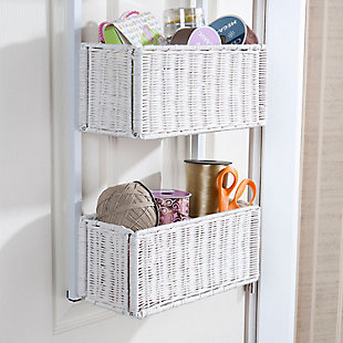 Why dig through the attic or closet for what you need, when you can make the most of wasted space with this over-the-door basket storage. With its trio of rattan woven baskets, this unit is the perfect way to organize everything from craft items and sewing accessories, to linens and cleaning supplies. It conveniently fits over most doors can be arranged to face room interiors or placed out of sight. Either way, what a handy home essential.Made of tubular metal and rattan | 3 storage baskets | Includes over-door hooks | Assembly time frame is 15 to 30 min.