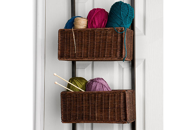 Why dig through the attic or closet for what you need, when you can make the most of wasted space with this over-the-door basket storage. With its trio of rattan woven baskets, this unit is the perfect way to organize everything from craft items and sewing accessories, to linens and cleaning supplies. It conveniently fits over most doors can be arranged to face room interiors or placed out of sight. Either way, what a handy home essential.Made of tubular metal and rattan | 3 storage baskets | Includes over-door hooks | Supports up to 10 lbs. per basket | Assembly time frame is 15 to 30 min.