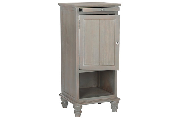 A quaint—and practical—accompaniment to country cottage and modern farmhouse interiors, this storage cabinet in French gray is loaded with possibilities, from the family room to the guest bath. Charming beadboard-style cabinet reveals ample stowaway space. Open cubby makes whatnots so accessible, while pullout tray extends your surface space for everything from makeup to snacks and remote controls.Made of wood | French gray finish | Cabinet storage with shelf | Open cubby | Pull-out tray | No assembly required