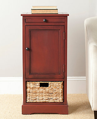 A quaint—and practical—accompaniment to country cottage and modern farmhouse interiors, this storage cabinet in distressed red is loaded with possibilities, from the family room to the guest bath. Roomy cabinet with shelving reveals ample stowaway space. Open cubby with rattan basket makes whatnots so accessible, while pullout tray extends your surface space for everything from makeup to snacks and remote controls.Made of wood | Distressed red finish | Cabinet storage with shelf | Open cubby | Pull-out tray | Woven rattan storage basket | No assembly required