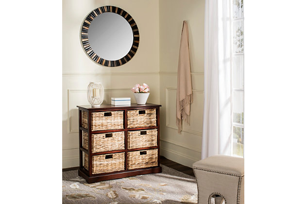 Getting a little short on storage space? Look no further than this perfectly charming—and practical—6-basket storage shelf. The ideal way to organize any room in the house, six spacious woven baskets tuck neatly into a rugged red pine cabinet. As versatile as it is attractive, use it in place of a dresser, sideboard or TV stand for that much more cool character.Made of pine | Vintage cherry finish | 6 open cubbies | 6 woven rattan storage baskets with cutout handles | No assembly required