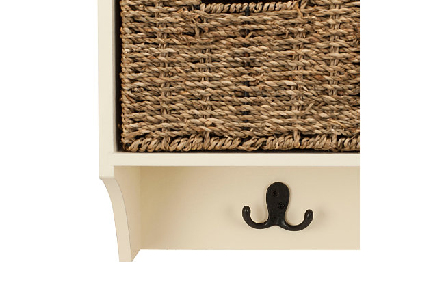 With its crisp, white finish and rustic woven baskets, this 3-basket hanging wall shelf is a charming addition to your modern farmhouse or country cottage aesthetic. Wall-mount design frees valuable floor space in the bath, hallway or anywhere you see fit. Three removable baskets and three double hooks keep your items nicely organized and close at hand.Made of wood and engineered wood | White finish | 3 open cubbies | 3 woven rattan storage baskets | 3 metal hooks with dark iron-tone finish | Mounting hardware not included