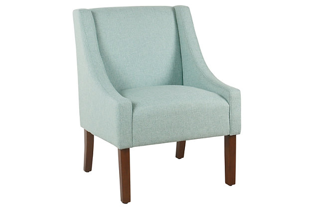 The graceful swoop-arm styling of this accent chair sets the tone for all proclaimed casually cool spaces. A rich wood finish, designer fabric and welted cushions perfect the laid-back vibe.Made of wood and engineered wood | Attached cushions | Medium firm foam and sinuous spring cushions | Woven textured light aqua fabric upholstery | Welted seams | Exposed legs with walnut finish | Assembly required