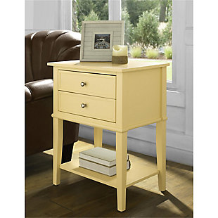 Whether flanking a sofa or chair or serving as a dreamy nightstand, this accent table in yellow is loaded with charm and potential. Sure to look right at home in modern farmhouse and cottage chic settings, this accent table with two drawers and a display shelf is compact yet accommodating.Made of wood and engineered wood | 2 drawers | Fixed shelf | Assembly required