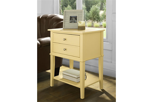 Whether flanking a sofa or chair or serving as a dreamy nightstand, this accent table in yellow is loaded with charm and potential. Sure to look right at home in modern farmhouse and cottage chic settings, this accent table with two drawers and a display shelf is compact yet accommodating.Made of wood and engineered wood | 2 drawers | Fixed shelf | Assembly required