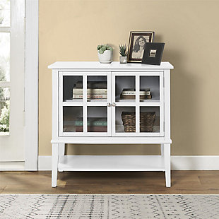 Master the art of organization in an entryway, main living area or home office with this highly versatile 2-door storage cabinet in white. Glass-front double doors with mullion frame reveal a roomy storage cabinet with adjustable shelving. Lower shelf makes this compact piece that much more accommodating.Made of wood and engineered wood | 2 doors with glass panels | Adjustable door hinges | Adjustable cabinet shelf; fixed lower shelf | Assembly required