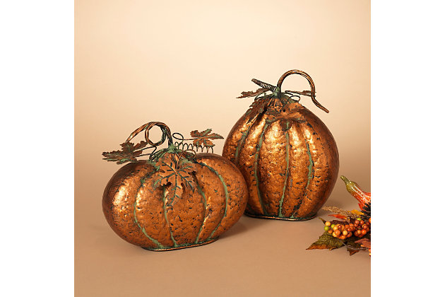 Enjoy endless possibilities for seasonal decorating with these copper-tone metal pumpkins. The hammered effect infuses rich texture and a realistic sensibility. Curling tendril and leaf accents enhance the aesthetic beautifully.Set of 2 | Made of iron | Copper-tone finish with hammered-effect texture