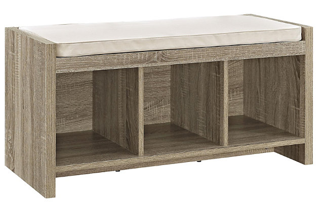 Take a seat—anywhere you like—with this stylish and versatile storage bench. An ideal addition to your entryway or mudroom, it’s also equally welcome at the foot of the bed. Three open cubbies provide plenty of options for storage. Wrapped in a light beige fabric, the thickly padded seat caters to your comfort.Made of engineered wood | Distressed light brown finish | 3 cubbies | Foam cushioned seat | Beige polyester upholstery | Assembly required