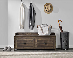 Whether you’re coming or going, you’re sure to appreciate the charm and practicality of this storage bench. An essential for an entryway, foyer or mudroom, it’s home to everything you need. This spacious bench offers a place to perch your handbag or swap out your shoes, while the roomy storage drawers provide plenty of ways to stay organized.Made of laminated engineered wood | Weathered brown woodgrain finish | Barn door detail on sides | 2 storage drawers with faux linen lining | Bin-pull hardware with label holder | Drawers with durable metal slides | Assembly required