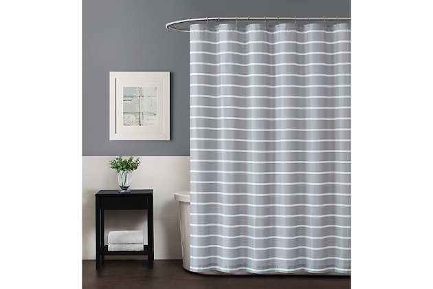 So soft to the touch and easy on the eyes, this chic shower curtain is such a refreshing sight. Double brushed for added softness, this shower curtain delights with a horizontal striped pattern on dyed fabric that’s ideal for a serene scene.Made of microfiber polyester | Includes reinforced hook holes | Liner not included | Imported | Machine washable