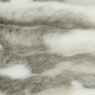 Indulge yourself with the luxurious feeling of faux angora. The lush texture will help you add a certain decadence to your space. Toss this sumptuous pillow anywhere you want to create a warm, plush ambiance.Made of faux angora rabbit fur with polyester back | Soft polyfill | Zipper closure | Spot clean | Imported