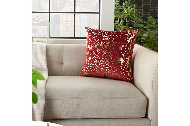 Spatter your home with style. The metallic print of this decorative pillow brings light into your space in a cool, modern way. Reminiscent of mid-century art, it makes a splash anywhere you toss it.Made of polyester | Handcrafted | Soft polyfill | Zipper closure | Spot clean | Imported