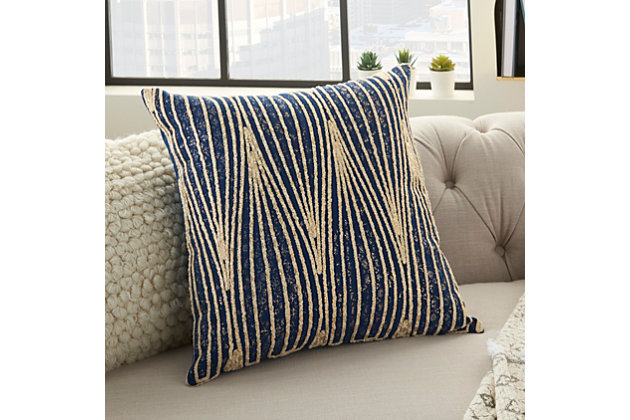 Add interest and texture to your space with the eye-catching lines of this decorative pillow. For style and comfort, toss this cushion anywhere.Made of cotton | Handcrafted | Soft polyfill | Zipper closure | Spot clean | Imported