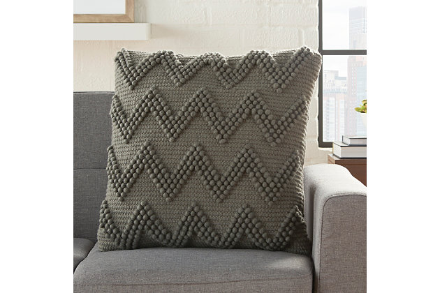 Drop some texture into your space with this cleverly stylish pillow. Crafted with a cool chevron pattern, this cushion adds visual value to your home decor.Wool front; cotton back | Handmade | Soft polyfill | Zipper closure | Spot clean | Imported
