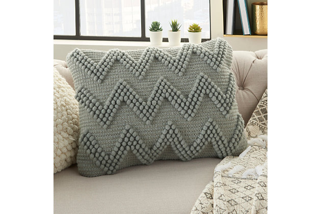 Drop some texture into your space with this cleverly stylish pillow. Crafted with a cool chevron pattern, this cushion adds visual value to your home decor.Made of cotton | Hand-woven | Soft polyfill | Zipper closure | Spot clean | Imported