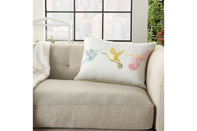 Add a naturally beautiful element to your decor with this hand-beaded accent pillow. Trio of hummingbirds set against an ivory background is sweetly chic and teeming with texture.Made of cotton | 14" x 20" | Soft polyfill | Removable cotton cover | Zipper closure | Spot clean | Imported