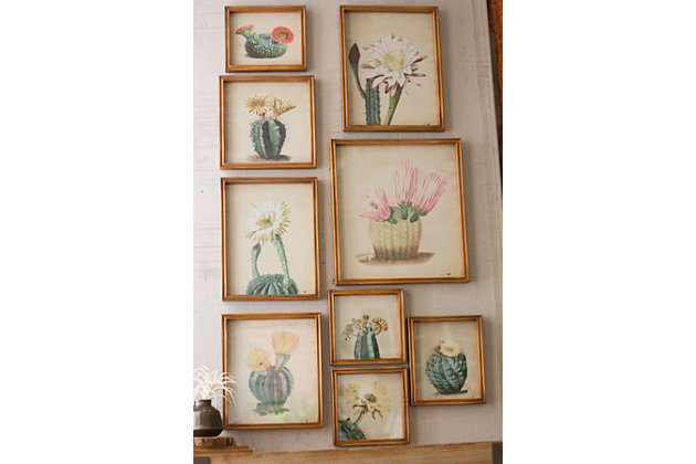 Keep your space looking sharp with this 9-piece set of high-quality framed prints. Nine cactus plants are painted in lush green hues that infuse liveliness into a room. Vibrant multi-colored flowers disrupt the monochrome palette beautifully. Hang as a large wall collage, prop on a shelf or display in various ways around your home.Set of 9 | Matte giclée reproduction on paper | Glass face | Multi-colored | Natural wood frames | D-ring hanger