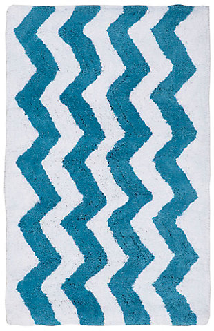 The cool breezy vibe of a beachfront resort comes to bathroom decor in the soft feel and engaging colors of this chevron tufted bath mat. Waves of Arizona blue and ivory roll across fine Indian cotton, adding a stylish look and comforting feel underfoot to any bathroom decor. A non-slip backing keeps the mat firmly in place. Set of 2 | 100% Indian cotton | Arizona blue and ivory | Non-slip latex backing | Machine wash | Imported
