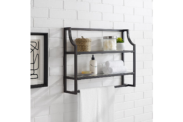 Stack up cool style with this pagoda-inspired display shelf. Designed to add much-needed bathroom storage, two tiered shelves and a hanging bar provide an open and elegant use of space. Display towels, trinkets or succulents atop clean, tempered glass shelving for a unique presentation of your favorite treasures or bathroom essentials.Steel frame with oil-rubbed bronze-tone finish | 2 tempered glass shelves and towel bar | Ready to hang | Assembly required