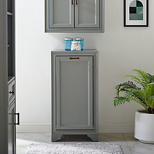 Bring a sense of order to your bathroom with this chic laundry hamper. Designed to add appeal while hiding its true function, its cottage styling and removable laundry bags provide an elegant use of space. At home in the tightest or most spacious bath, its compact footprint allows you to live large in small places.Pine frame with birch veneer | Gray finish | Metal hardware with distressed brass-tone finish | 2 removable cloth bags | Assembly required