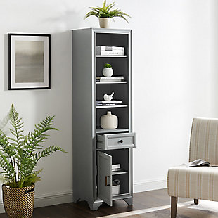 Bring a sense of order to your bathroom with this chic linen cabinet. Designed to add much-needed bathroom storage, its tiered shelves, full-extension drawer and roomy cabinet provide an elegant use of space. At home in the tightest or most spacious bath, its compact footprint allows you to live large in small places.Pine frame with birch veneer | Gray finish | Metal hardware with distressed brass-tone finish | 3 shelves | Full-extension drawer | Roomy cabinet space | Assembly required