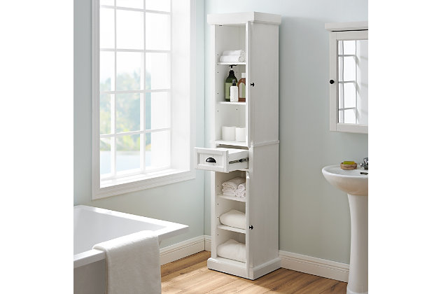 Bring a sense of order to your bathroom with this chic linen cabinet. Designed to add much-needed bathroom storage, its beadboard styling and roomy cabinets provide an elegant use of space. At home in the tightest or most spacious bath, its compact footprint allows you to live large in small places.Pine frame | White finish | 2 hinged cabinet doors with beadboard paneling | 4 adjustable shelves | Full-extension drawer | Metal hardware in gunmetal finish | Assembly required