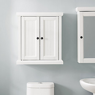 Bring a sense of order to your bathroom with this chic wall cabinet. Designed to add much-needed bathroom storage, its beadboard panel doors and roomy cabinet provide an elegant use of space. At home in the tightest or most spacious bath, its compact size allows you to live large in small places.Pine frame | White finish | Metal hardware with gunmetal finish | Double door cabinet space with 2 adjustable shelves | Ready to hang | Assembly required