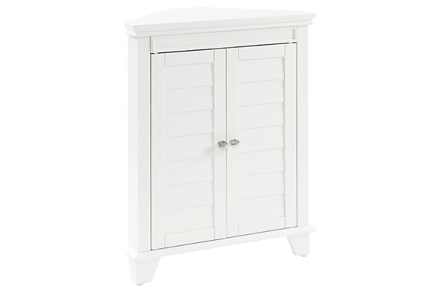 Bring a sense of order to your bathroom with this chic corner cabinet. Designed to add much-needed bathroom storage, its cottage styling and adjustable shelving provide an elegant use of space. At home in the tightest or most spacious bath, its compact footprint allows you to live large in small places.Pine frame | White finish | Double door cabinet with louvered detail and metal hardware | 2 adjustable shelves | Assembly required