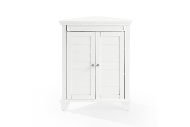 Bring a sense of order to your bathroom with this chic corner cabinet. Designed to add much-needed bathroom storage, its cottage styling and adjustable shelving provide an elegant use of space. At home in the tightest or most spacious bath, its compact footprint allows you to live large in small places.Pine frame | White finish | Double door cabinet with louvered detail and metal hardware | 2 adjustable shelves | Assembly required