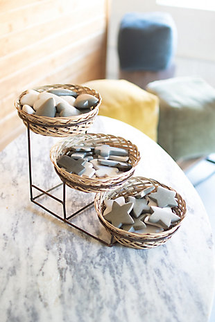This three-tiered display basket with metal stand is a naturally attractive addition to your home. Quality crafted of seagrass, it’s durable and a great way to organize with style, while the tiered holder lets you see all your items at one time.Made of metal and seagrass | Brown and beige | 3 handwoven baskets | 3-tiered frame | Minor assembly required