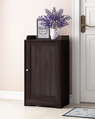 Bring a sense of order to your bathroom with this striking bathroom storage piece. Styled with clean lines for a modern look, this engineered wood cabinet is a delightful addition to any room. Complete with a combination of top display space and cabinet storage, it’s ideal for those smaller bathrooms that need organization.Made of engineered wood | Espresso finish | Beadboard door cabinet with adjustable shelf | Top display surface with gallery rail | Clean with damp cloth | Easy assembly with provided hardware