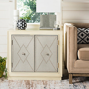 Bring style and substance to the modern living room with the unique Erin Chest. An antique beige finish perfectly frames the light gray linen panels on its two doors, and nickel-tone nailhead detail makes Erin a new contemporary treasure.Mdf/acacia wood | No assembly required | Shelf dimensions: 30.5" x 15" x 11.6"
