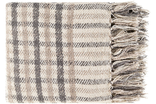 Mad about plaid? This sophisticated yet striking throw blanket is the perfect anchor for any living space. Its classic good looks and versatility make it an essential accent for almost any style of decor. Made of acrylic/nylon  | Fringe accent | Spot clean recommended, line dry | Imported