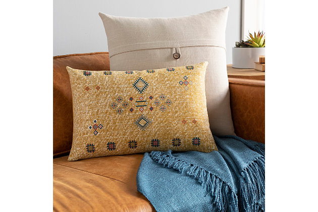 This throw pillow aims to please with a cool take on tribal-hip style. Add an exotic element to your space to create a mood of easy, effortless elegance.Cotton cover | Polyfill insert included | Spot clean recommended, line dry | Imported