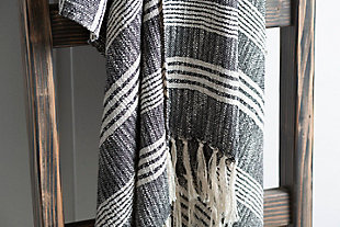 Fringe benefit. Sporting fringed details for a fun, flirty feel, this easy-elegant throw blanket has so much appeal. What a timeless choice for incorporating texture and tone and making a space more alluring.Made of cotton | Fringe accent | Spot clean recommended, line dry | Imported