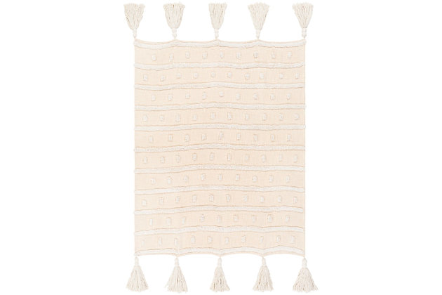 Fringe benefit. Sporting fringed details for a fun, flirty feel, this easy-elegant cotton throw blanket has so much appeal. What a timeless choice for incorporating texture and tone and making a space more alluring.Made of cotton | Tassel accent | Spot clean recommended, line dry | Imported