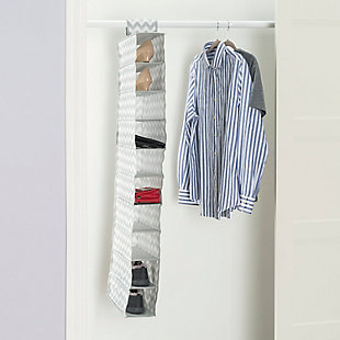 Store and organize your household essentials in this hanging organizer. Made from heavy duty breathable non-woven material, it features 10 shelves in a vertical orientation to provide ample space for clothes and more. Hangs on most standard closet rods. Velcro strap to secure the organizer. Collapsible when not in use.Made of non-woven material | 10 spacious shelves to neatly organize all your household essentials | Chevron finish adds a classic chic flair to your closet | Velcro strap to secure the organizer