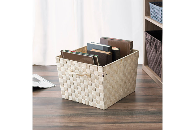 Bring order to the chaos by placing all your belongings in this open woven storage bin. The bin features handles to make is easy to pull of your top shelf or carry around when needed. Crafted from thick non-woven piping securely attached to a wire frame, it maintains its shape and structure.Ideal for storing arts and crafts, household essentials, office supplies, and toys | Stackable for easy compact storage | Handles for easy carrying | Made of woven fabric over a steel frame for stability