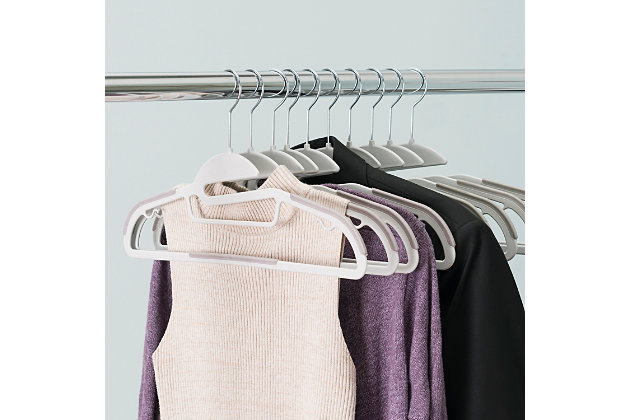 Keep your clothes off the floor using this non-slip hanger. Made of heavy duty plastic, it features small indents for clothes with small straps.Made of plastic | Small indents to hold clothes with slim straps | Contoured frame helps clothes maintain form