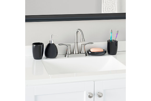 Grace your bathroom vanities with a modern flair by displaying this four piece contemporary bath accessory set. This set includes all the essentials to get you through your routine. From the rounded lotion dispenser with durable stainless steel pump for easy dispensing, generous size tumbler for rinsing or drinking, a large soap dish to store your favorite bar of soap, and 4 slot toothbrush holder to keep your toothbrushes organized. The beautiful matte finish and a simple design coordinates perfectly with virtually any bathroom style. Whether you need to dispense your favorite silky smooth and delightfully fragrant lavender scented lotion or need to stylishly store away your toothbrush after cleaning that million dollar smile, this set provides the perfect blend of functionality and timeless style to your bathroom.Fully functional 4 piece bath ensemble: 4 piece bathroom accessory set adds style and function to the counter or vanity with its durable ceramic material and beautiful sleek finish. | Perfect for any décor: solid hue adds a cohesive look to any bathroom décor. | Great for any occasion or any setting: artfully arrange each piece on a serving tray (sold separately) for an effortlessly elegant bath set up that is both functional and stylish. The four piece bath is perfect as a housewarming present, wedding gift, or anyone looking to equip their bath with a set of accessories that are practicable | Designed to love and last: made of durable ceramic, each piece is offers smooth-to-the-touch surface that feels sumptuous in your grasp. Sturdy stainless steel pump on the lotion dispenser is designed to be rust-proof