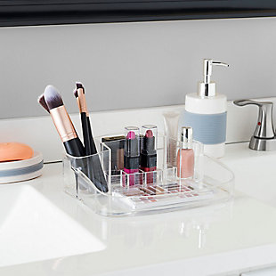 Because it takes too much time to rummage through cluttered drawers to find your make up must-haves and beauty essentials to get you looking your best from head-to-toe. Speed-up your morning routine, by having your personal grooming tools right at your fingertips with this medium size plastic cosmetic organizer.  The clear acrylic construction lets you effortlessly view what you need while also coordinating perfectly with any bathroom decor. With 10 compartments, enjoy having your own personalized beauty counter. Fill each space with nail polish, a small lotion bottle eye shadow, foundation, jewelry, and small accessories, and more. You don't have to sacrifice fashion for space, clear the clutter and display yourMade of clear acrylic plastic | Transparent design coordinates with any décor and lets you easily spot what you need | Ideal for storing small cosmetic products, keepsakes, and accessories | Perfect for the bathroom vanity or dresser
