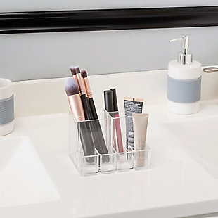 The perfect compact organizer to house your basic essentials without taking up too much room on your counter. It’s also conveniently sized to take with you while you travel, so you’ll always have your beauty tools to keep you looking flawless no matter where you are! Each compartment keeps your stash of cosmetics standing upright so can have easily grab them at your convenience. Use the four sections to keep your polishes in one place and the rest for keeping your liners, pencils, foundations right at your finger tips. The entire organizer can be washed by hand should you encounter the dreaded foundation spill, or can be spot clean on occasion.4 compartments for organizer polishes with additional storage for other essentials: the front portion features four compartments to keep your polishes at the ready for the next manicure and pedicure, with the remaining section for brushes, concealers, glosses, and lip sticks | Crystal clear color to quickly view contents without having to lift out each tier: easily spot what inside without having to slide out tier. | Compact in size to not take up too much space: perfect if you’re limited on space, easily tuck this compact organizer away in the corner of the vanity, dresser, countertop. The lightweight and compact size also make it great to bring on the go. | Designed to love and last: made of clear, shatter-resistant plastic this organizer is lightweight and won’t crack or break if accidentally dropped compared to glass and ceramic make up organizers.