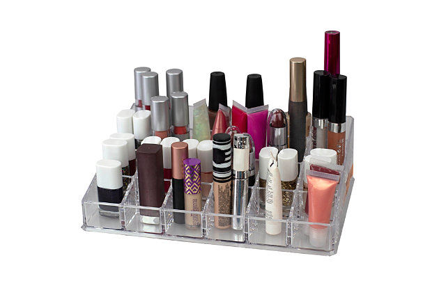 Keep your cosmetic collection accessible and in check with this plastic make-up display case. Made of solid plastic, it provides durable storage for up to 24 nail polishes, glosses or brushes. For added convenience, its transparent plastic exterior shows everything inside so you’ll never have to dig through the depths of your make up bag again! Hand wash. Dry completely.24 square compartments: 24 square compartments provides storage for brushes, polishes, glosses, lip sticks, and contour brushes | Stylish and versatile: great for professional and home use, this plastic make up display organizer is great to line up your everyday beauty supplies, grooming tools, and accessories in a salon | Crystal clear color to quickly view contents: the organizer is completely clear in color to easily spot what is inside | Made of durable bone china