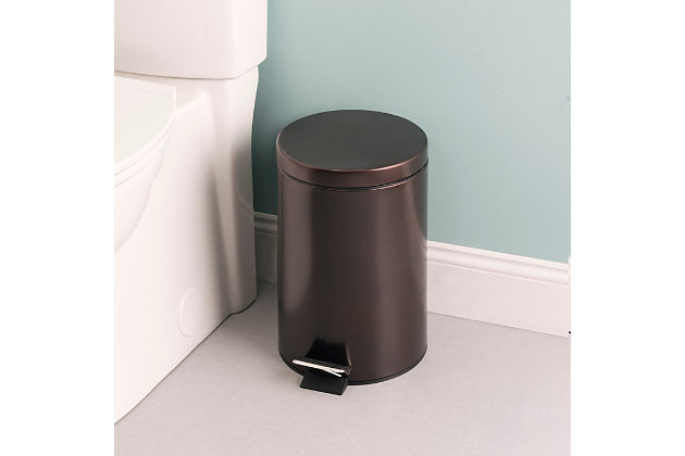 Keep any room clean and free of trash with this rounded stainless steel waste bin. It features a rich bronze finish that warms up a cold contemporary space with a sophisticated touch. A Step activated lid adds convenience, by keep garbage and its unsightly odors solely within the confines of the interior plastic bucket. Easily remove the bucket by lifting the metal handle to clear the contents then slide it back inside when finished. The non-skid base also prevents the bin from slipping or tipping over, making it great to use within or outside your home. Holds 12 liters worth of garbage.Closed design to conceal contents | 12 liter capacity | Pedal operated lid provides a sanitary way to discard garbage | Closed design to conceal contents
