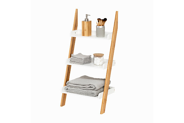 This 3-Tier Leaning Bathroom Ladder Shelf is the perfect storage option for your bathroom. From cotton balls to bath towels, it keeps your daily essentials within reach and looks good doing it. Its bamboo base and white shelves fit any bathroom décor.Ladder includes 3 shelves for organizing and storing all your bathroom essentials | Made of durable mdf and eco-friendly bamboo | Shelf weight capacity is 10-pounds per shelf | Dimensions: 18"w x 35"h x 12"d