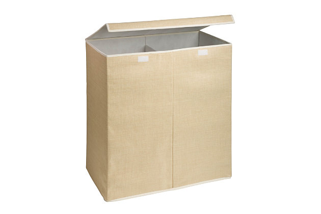 Tall, lined and attractive—you’ve got a type when it comes to your taste in laundry bins. That’s why you couldn’t take your eyes off of this Large Dual Laundry Hamper with Lid when it walked into the room. Its sleek resin exterior oozes sophistication, making it a stylish hamper for your bedroom or any room you see fit. You can even use it as a makeshift storage bin to stow away bedding, throw pillows or extra decor—then stow it away when it’s not in use. And if you’re looking to put its sturdy stature to work as an actual laundry sorter, its breathable, two-bin interior will help you breathe easier on chore day, too.Two compartment laundry hamper with lid | Durable wicker exterior; breathable canvas interior | Collapsible hamper folds flat for easy storage