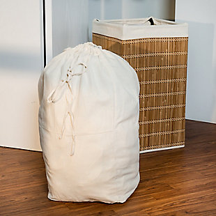 You’ve been adulting for years—now it’s time your laundry bin catches up to you. This Square Wicker Bamboo Hamper with Hamper Bag is the perfect home organization piece to make you step back and think, “Yes, my dirty laundry has come a long way.” Passer-byers at dinner parties praise it for both its eco-conscious construction and genuine good looks. You like how its removable canvas hamper bag makes laundry day a breeze. And while it currently enjoys the good life as your trusted bathroom hamper, it may some day find a second home in your walk-in closet or holidaying near your washer and dryer.Square hamper made of renewable and sustainable materials | Contemporary wicker design and sturdy steel frame | Convenient removable canvas hamper bag