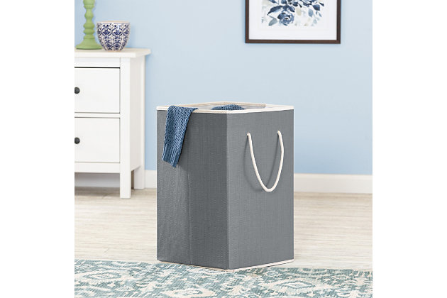 No more clothes piles to look at with this resin clothes hamper. The square shape and stylish exterior fit right into your space décor. It has a breathable liner that keeps away dirty clothes odor and you can grab it by the handles to take it easily back and forth to your laundry area.  Let’s face it, laundry day is laundry day, but at least it’ll look a little better with this clothes hamper around.Keep dirty laundry in order with this stylish clothes hamper | Durable resin exterior with breathable liner that keeps odor out of hamper | Handles provide mobility | Folds flat for easy storage